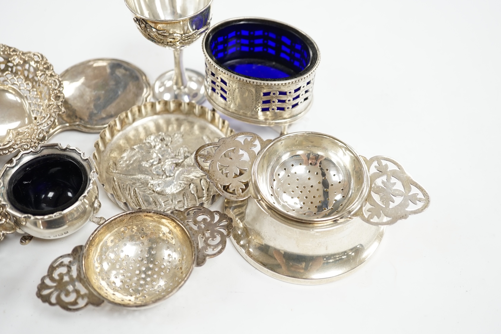 Sundry small silver including a, tea strainer, handbag mirror, pin dish, pair of bonbon dishes, two condiments and a Chinese white metal egg cup?. Condition - fair